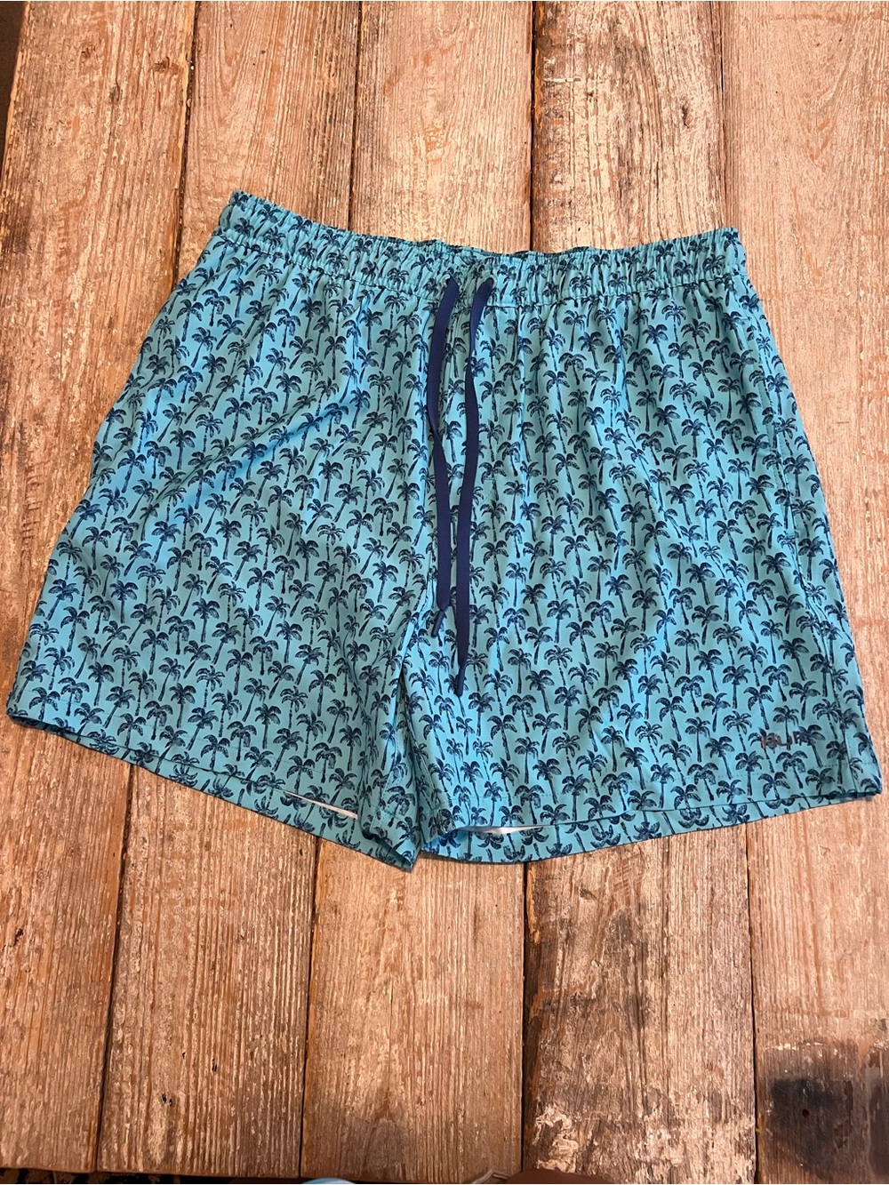 Huk Blue Swim Trunks with Navy Palm Print